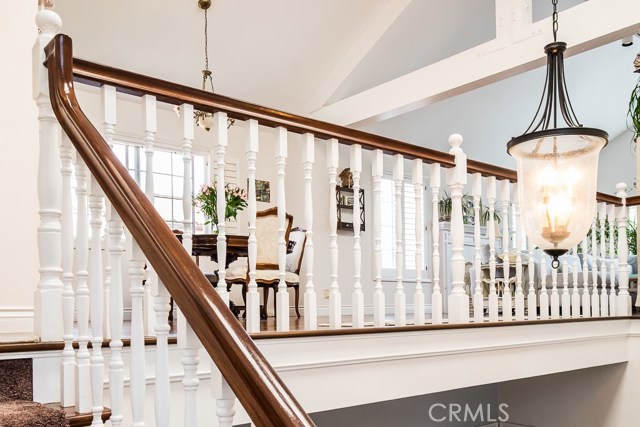 From staircase looking into dining and living rooms