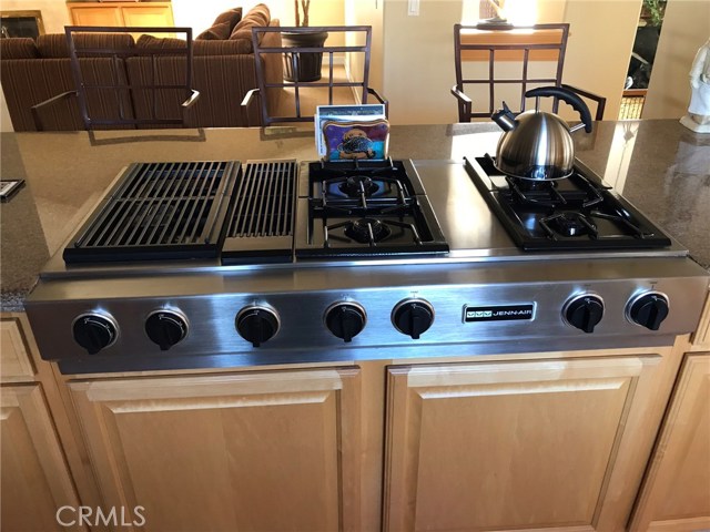 Center island of family style kitchen.