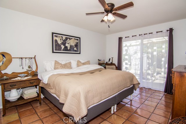 NICE SIZE MASTER BEDROOM WITH YOUR PRIVATE SLIDING GLASS DOORS TO YOUR TROPICAL BACK YARD.