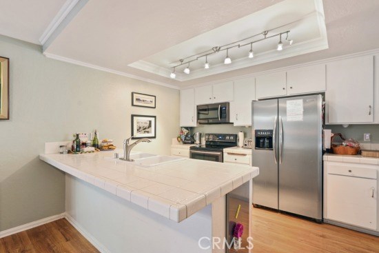 Breakfast bar and eating area off of kitchen