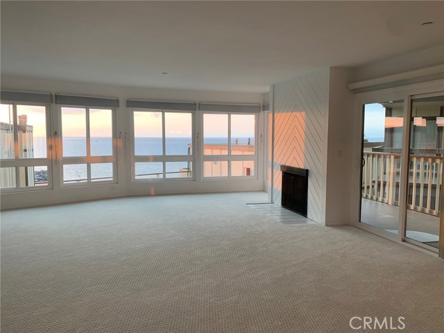 Sliding Glass Doors leading onto the Ocean View Balcony.