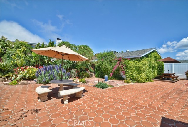 Patio, garden and an upper garden area ideal for growing vegetables