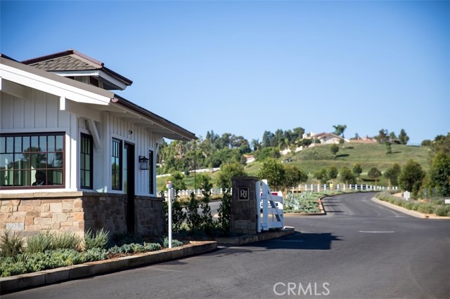 Private, gated entrance to the Residences of Rolling Hills Country Club