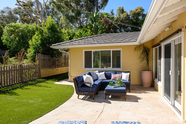 With extra space between the neighbors, sunlight fills the central courtyard (fresh landscaping will provide added privacy).  The easement allows easy access to Via la Selva - a favorite street for walkers.