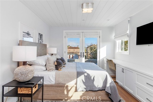 Bedroom #2 features built-ins, a private deck and a private bathroom