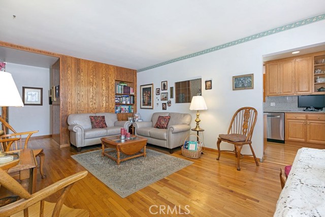 kitchen on the right and hall to bedrooms and family room on the left.
