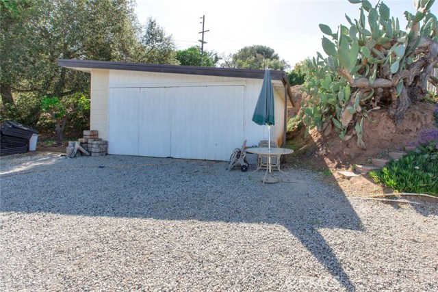 700 SF SHOP/4 car tandem garage with electrical and bathroom