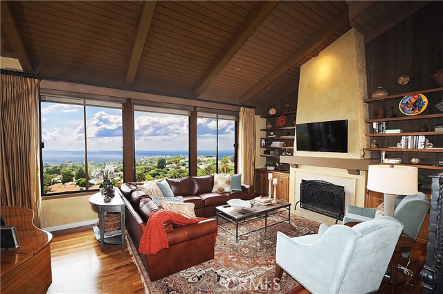 Great living room with fireplace and wonderful view.