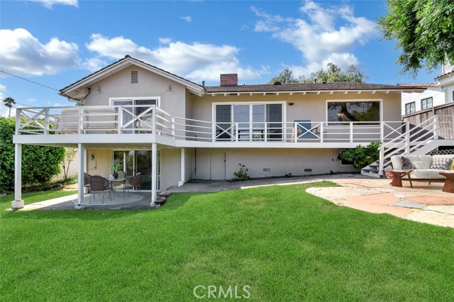 Wonderful yard with lots of grass plus double patios (one sheltered by the deck and one sheltered by a big tree).