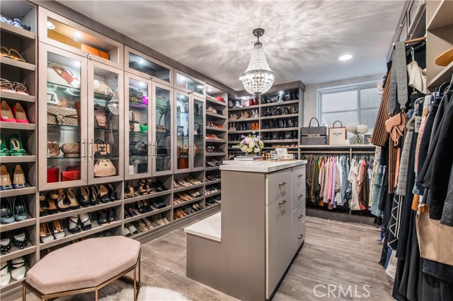 Custom designed closet easily holds 150+ pair of shoes!