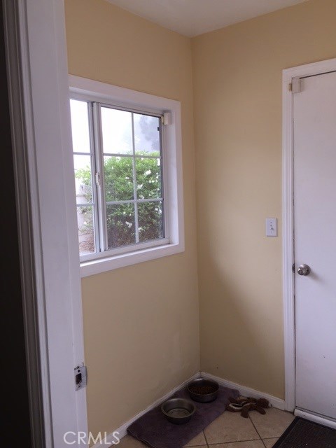 Mudroom on the sideyard with storage