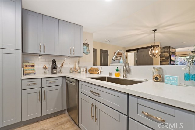 Functional and large kitchen with plenty of counter space and cabinet/drawer space! Love the Stainless Farm sink!