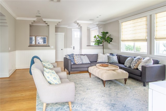 as you walk into this home you are greeted by light and an open floor plan with updates and custom details throughout