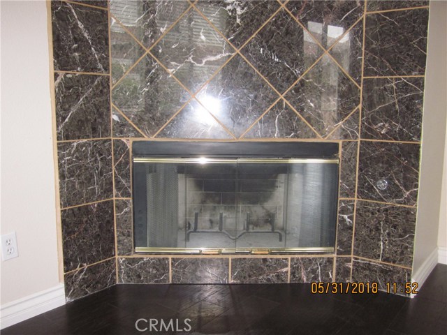 Luxuriously tiled fireplace.