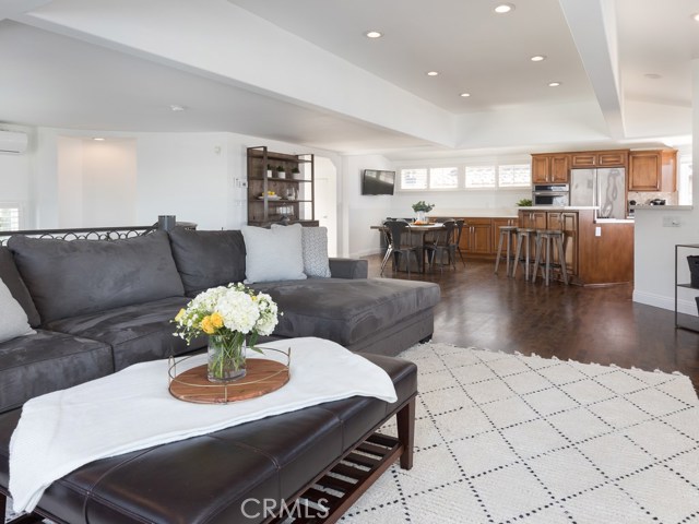 Great room - kitchen, dining, living and access to rooftop deck