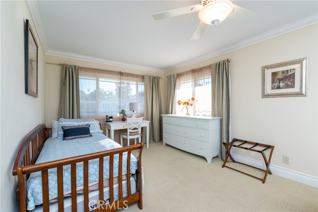 Here is the other side of the upstairs bedroom.  The owners have had out of town visitors often, and these two bedrooms have so much privacy from the rest of the home. It feels like its own apartment.