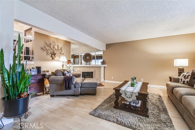 Look at this beautiful Living room with a roaring firplace