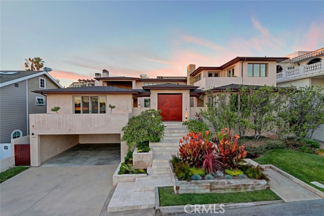 Modern luxury privately situated in Manhattan Beach's Hill Section.