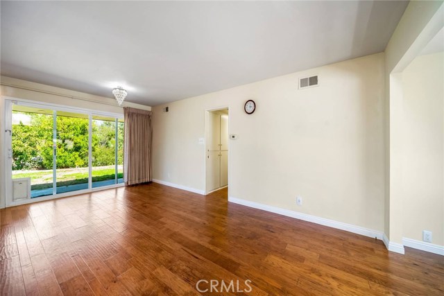 Large family room between kitchen and bedrooms.