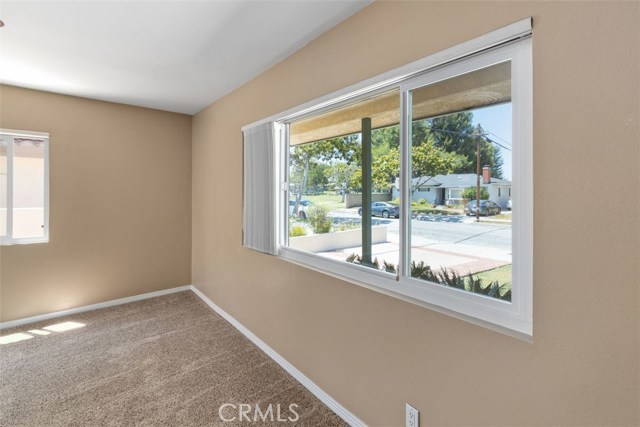 Picturesque living room window looking out to your close knit neighborhood