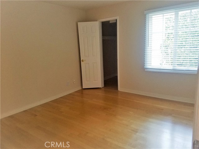 Downstairs bedroom with walk-in closet can also be used as an office