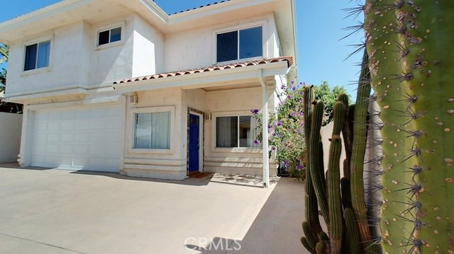 One of the largest homes in the neighborhood. Stucco exterior, Spanish tile roof, cathedral ceilings and plenty of natural light in the home. There's also a lovely garden, patio and a private backyard to enjoy.
