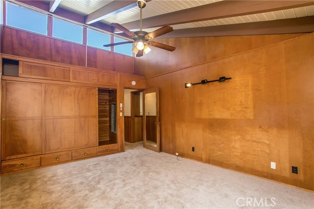 The 2nd bedroom has a full wall closet and clerestory ceiling windows flooding the room with light