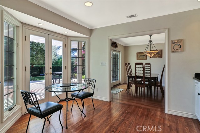 Another angle of dining nook and French doors to the Veranda