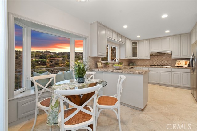 Kitchen with kitchen breakfast nook & window bench