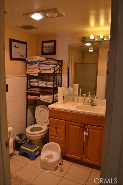 View of ground floor bath from opposite entryway. (hall entry off kitchen area)