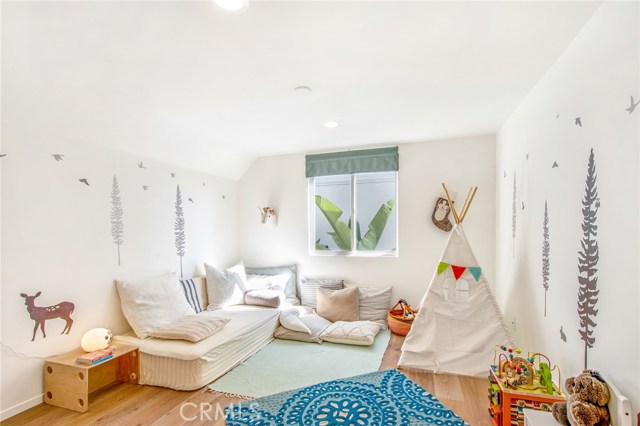 2nd level bedroom, shares a full bath in hall.