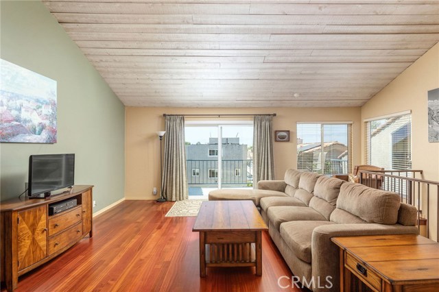 High vaulted ceilings (this picture is deceptive), cherry hardwood flooring, all dual paned windows and sliders (except one fixed window that does not open) and SPOTLESS!