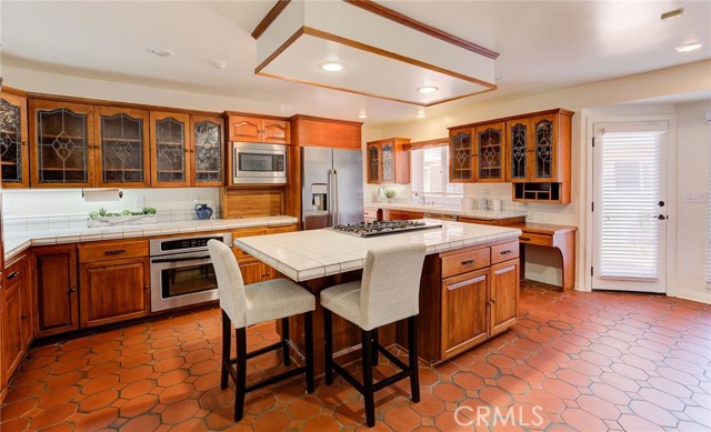 Spacious kitchen with center island and direct access to courtyard.