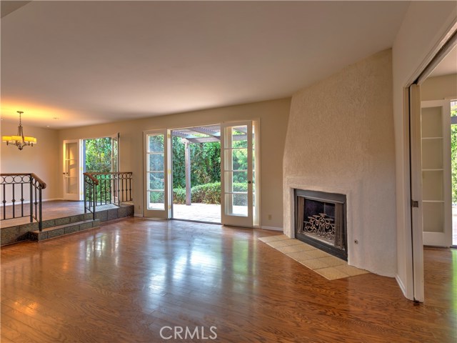 Living and dining room have french doors to private backyard