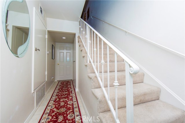 hallway on 1st level. The middle door is the master bedroom, the right door is the laundry area