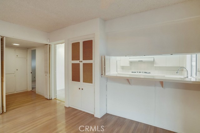 Family/Dining Room with Breakfast counter and built in hutch.