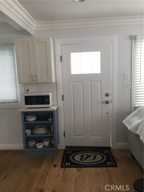 Downstairs unit entry with built in shelves