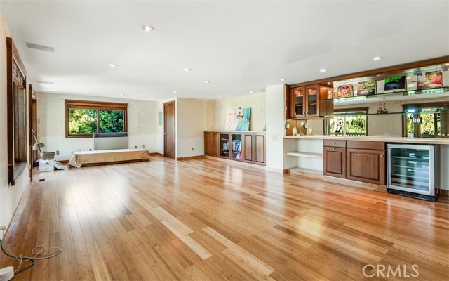 Detached 2nd level space with kitchenette and half bath. 1st floor 1 bed guest suite not pictured.