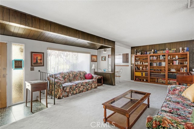 Living room is front facing and quite bright.