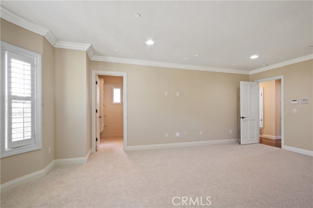 MASTERBEDROOM WITH PLANTATION SHUTTERS, CROWN MOLDING, RECESSED LIGHTING, NEW CARPET AND PAINT.
TWO WALK IN CLOSETS FOR HIS & HER!!!