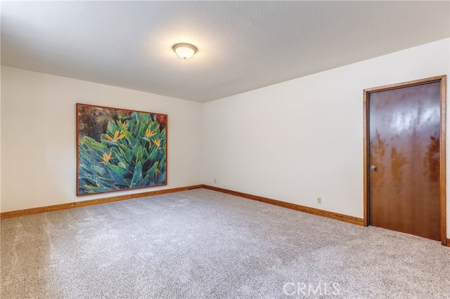 Entry level bonus room #1, new carpet, door to bonus room #2