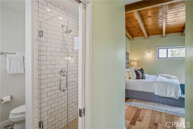 Master bath and hallway looking into the master bedroom. Everything is fresh and new and simply irresistible.