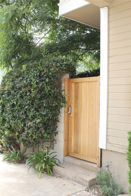 Patio in the backyard has it's own gate for added privacy.
