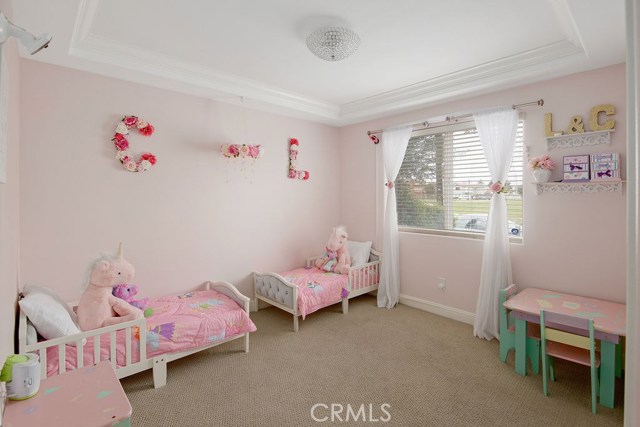 One of 2 spacious bedrooms on the first level