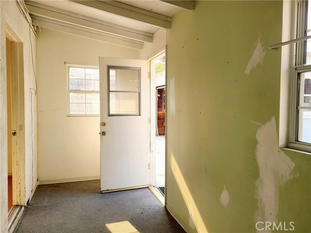 Laundryroom Off Kitchen Leads to Yard & Garage Laundryroom Off Kitchen Leads to Yard & Garage