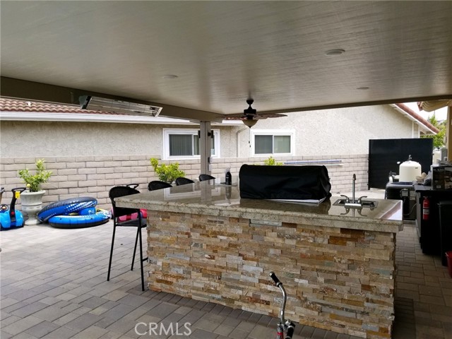 Backyard BBQ, wet bar and high counter area