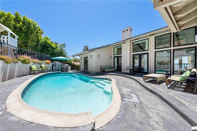 Wonderful back yard pool with newer decking!