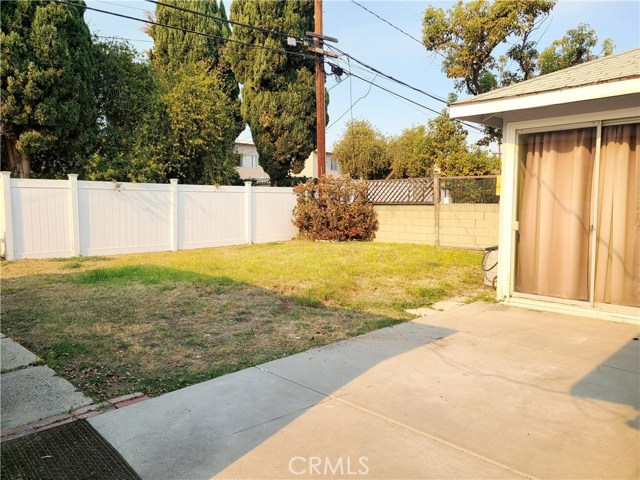 View of Yard, Back Patio & Sliding Door Leading to 3rd Bedroom View of Yard, Back Patio & Sliding Door Leading to 3rd Bedroom