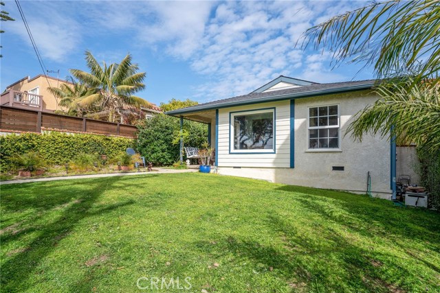 LARGE FRONT YARD OFF OF THE FRONT HOUSE.