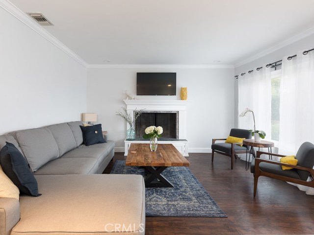 Living room with remodeled fire place and TV setup